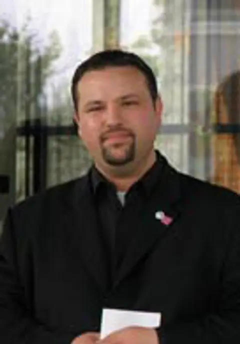 Christopher W Hartzell