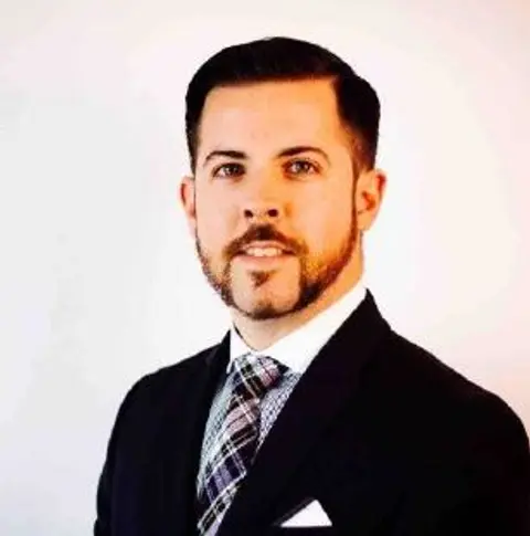 Nicholas Kuhns