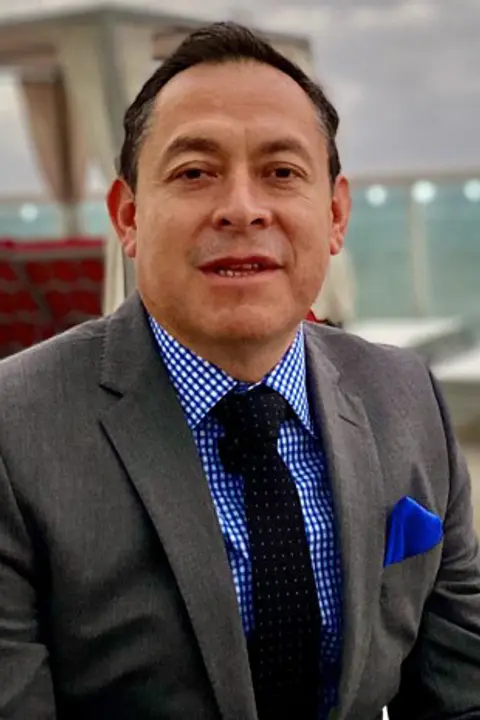 Alex J. Cisneros