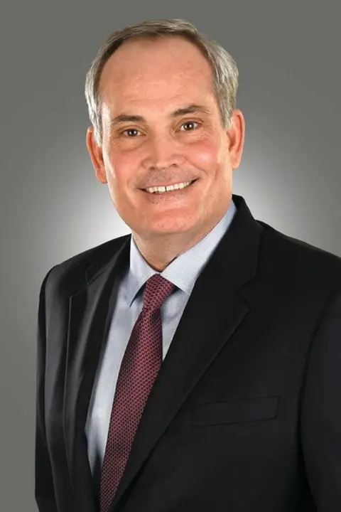 John E. Geller