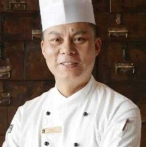 Qiguo Su