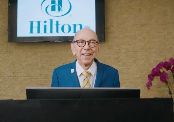 Meet Concierge Max Taylor, an Octogenarian Who Embodies the Spirit of Hospitality, as Hilton Celebrates Intergenerational Month