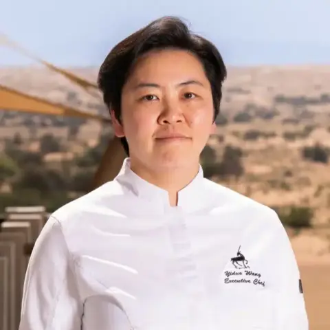 Chef Yidou Headshot 1 1140x1425.jpg