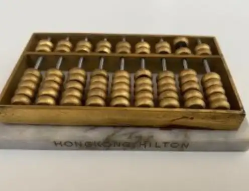 An Abacus, a One-Cent Note, and Fifty Years of Memory