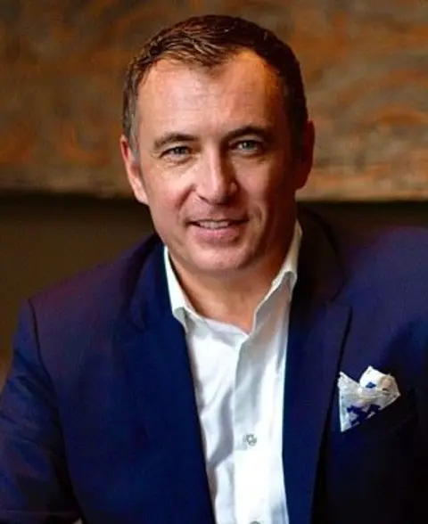Simon A. Fricker