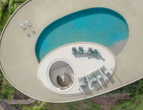 onion expands nature-inspired resort with pool villas atop thai mountains
