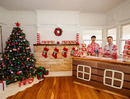 Craving a Sweet Escape? Win a Break in the IRL Aussie-Themed Booking.com KitKat Christmas Cabin
