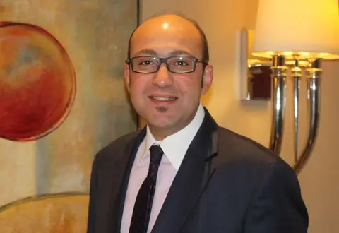 John Riad