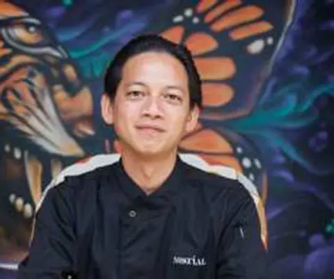 Louis Tan